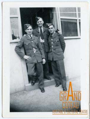 Photographic Print, unidentified men in uniform, soldiers, standing in a doorway.
