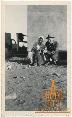 Photograph, Hymie and Jean Hanft posing with their infant son Larry Allan, 1950 