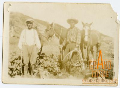 Photographic Print, 2 unidentified men posing with horses