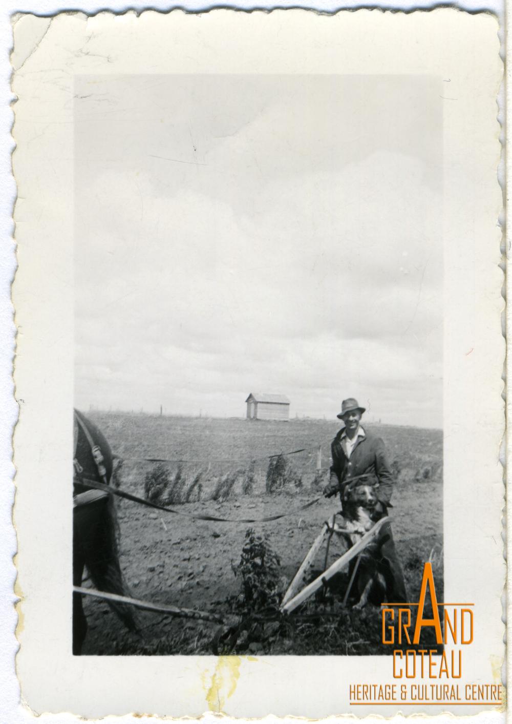 Photograph, Leonard 'Hymie' Hanft cultivating the garden, 1937