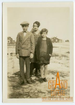 Photographic Print, unidentified young man, woman and girl