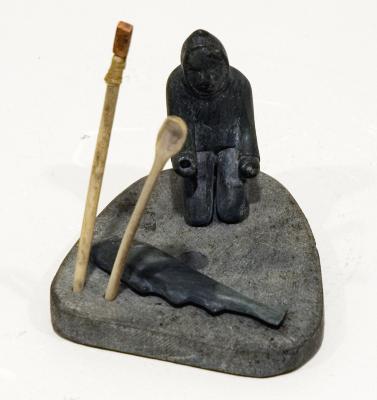 Fisherman with Fish and Tools