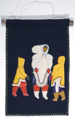 Woman in Parka with Two Children Playing