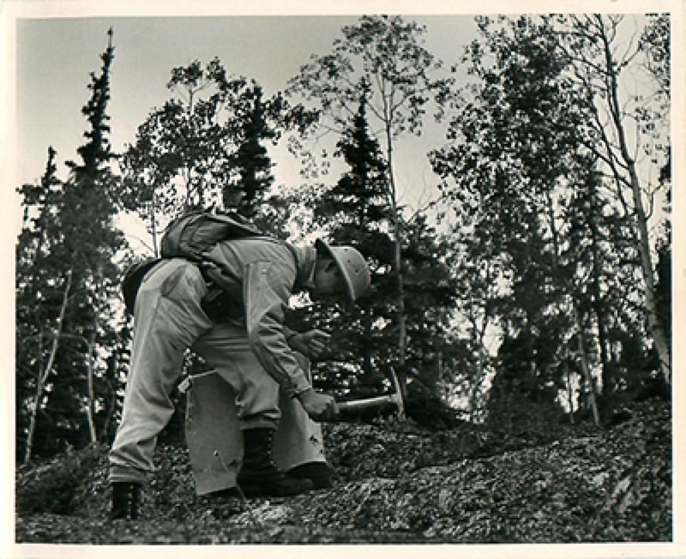 SK: Beaverlodge area - Geologist, Dr. L.S. Tremblay (of Geological Survey of Canada), checks out a claim.