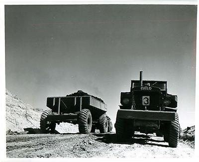 SK: Bienfait -- Large truck of the era at open-pit coal mine.