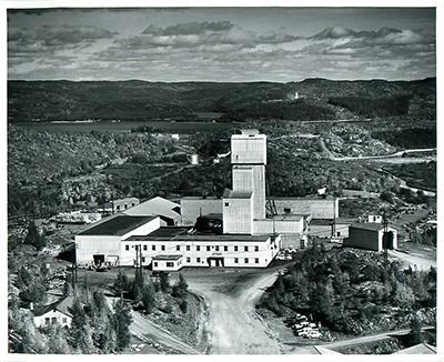 SK: Beaverlodge - Eldorado Mining’s headframe, mill and office buildings.