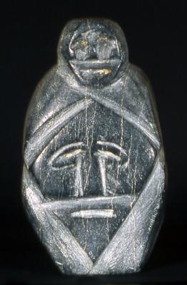 Figure with faces