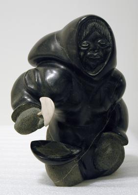 Woman with Ulu and Qulliq