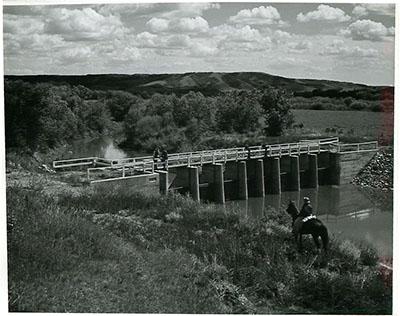 SK: Shaunavon area -- Creek dammed up for a reservoir for agricultural use.