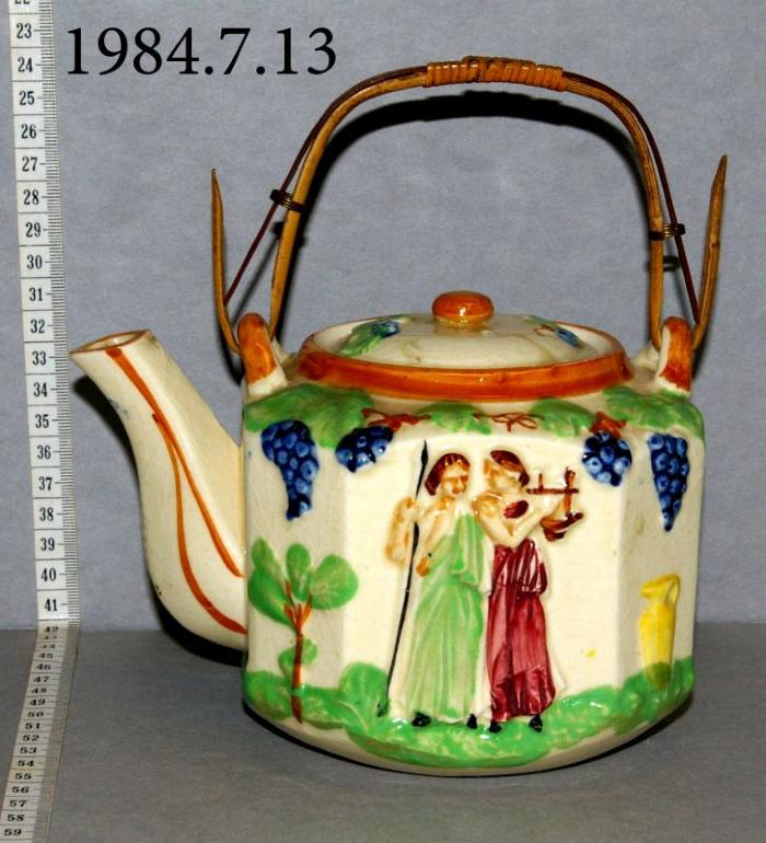 Teapot With Relief Figures