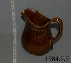 Brown Milk Pitcher (1901)