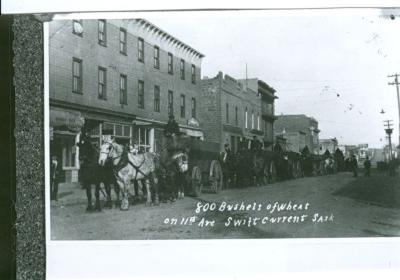 800 Bushels of Wheat, 11th Avenue, Swift Current (1914);800 Bushels of Wheat, 11th Avenue, Swift Current (1914);Photograph: 11th/ Central Ave., 1914