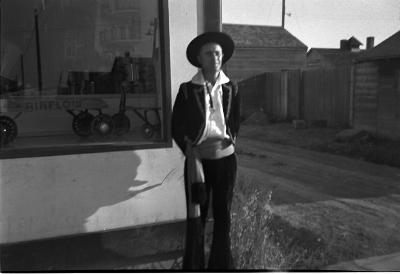 Photographic negative, Len Hymie Hanft in front of Beaver Lumber in Climax, October 1942