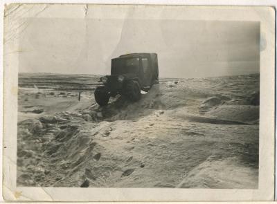 Photograph, Hymie Hanft's Jeep travelling over snow banks between Shaunavon and Gull Lake, February 1947