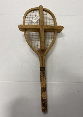 Tennis Raquet in press