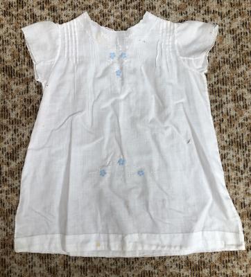 White muslin baby dress