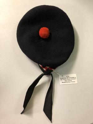 Scottish hat with red bobble on top - worn by musical entertainer Betty Grierson