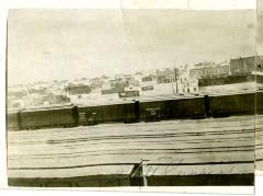 Railroad Tracks and Downtown Swift Current Postcard (c.1918)