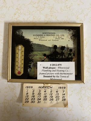 Wall plaque: <i>Whitewood Plumbing and Heating Co. -framed picture with thermometer</i>