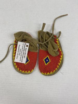 Beaded baby moccasins: <i>made by Lucille Kenny, used by Sasha Bear</i>