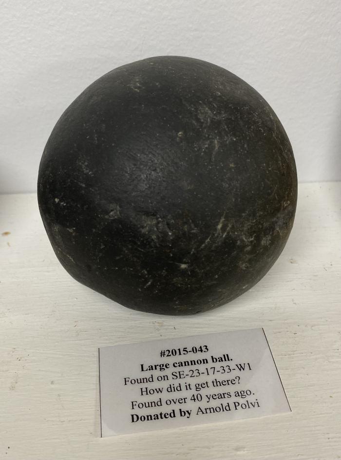 Large cannon ball. Found on SE-23-17-33-W1 How did it get there? Found over 40 years ago.