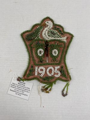 Bead work. Made by and belonged to Hilda Sandberg. Beaded to recognize the formation of Saskatchewan into a province in 1905.