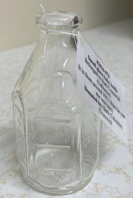 Small glass baby bottle - Belonged to Barb Cranswick (Tallentire)  It is from around 1951 (from the year she was born)