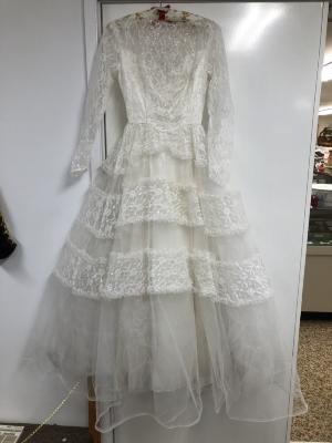 Lace Wedding Gown- was worn by Joan Johnson, who married Fred Harrison in Sept. 1958 (parents of Joan were Charlie and Winnifred Johnson). 