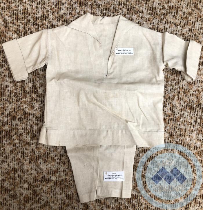 Child's beige suit - pants - worn by Dale Armstrong