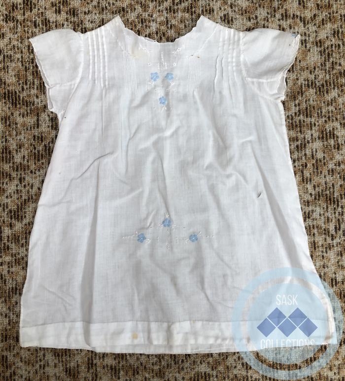 White muslin baby dress