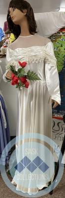 Wedding Dress - worn by Elsie Soloshy - daughter of Joe and Rosemary Soloshy - she married Walter Burdeny of Winnipeg on August 7, 1949  and she was born September 1923.