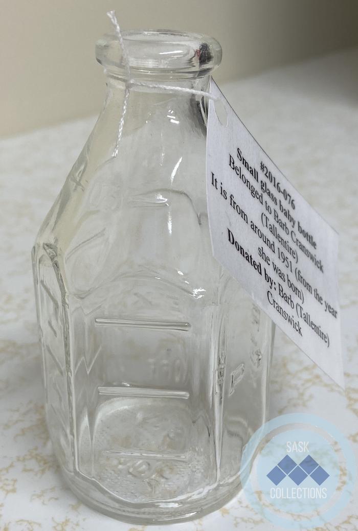 Small glass baby bottle - Belonged to Barb Cranswick (Tallentire)  It is from around 1951 (from the year she was born)
