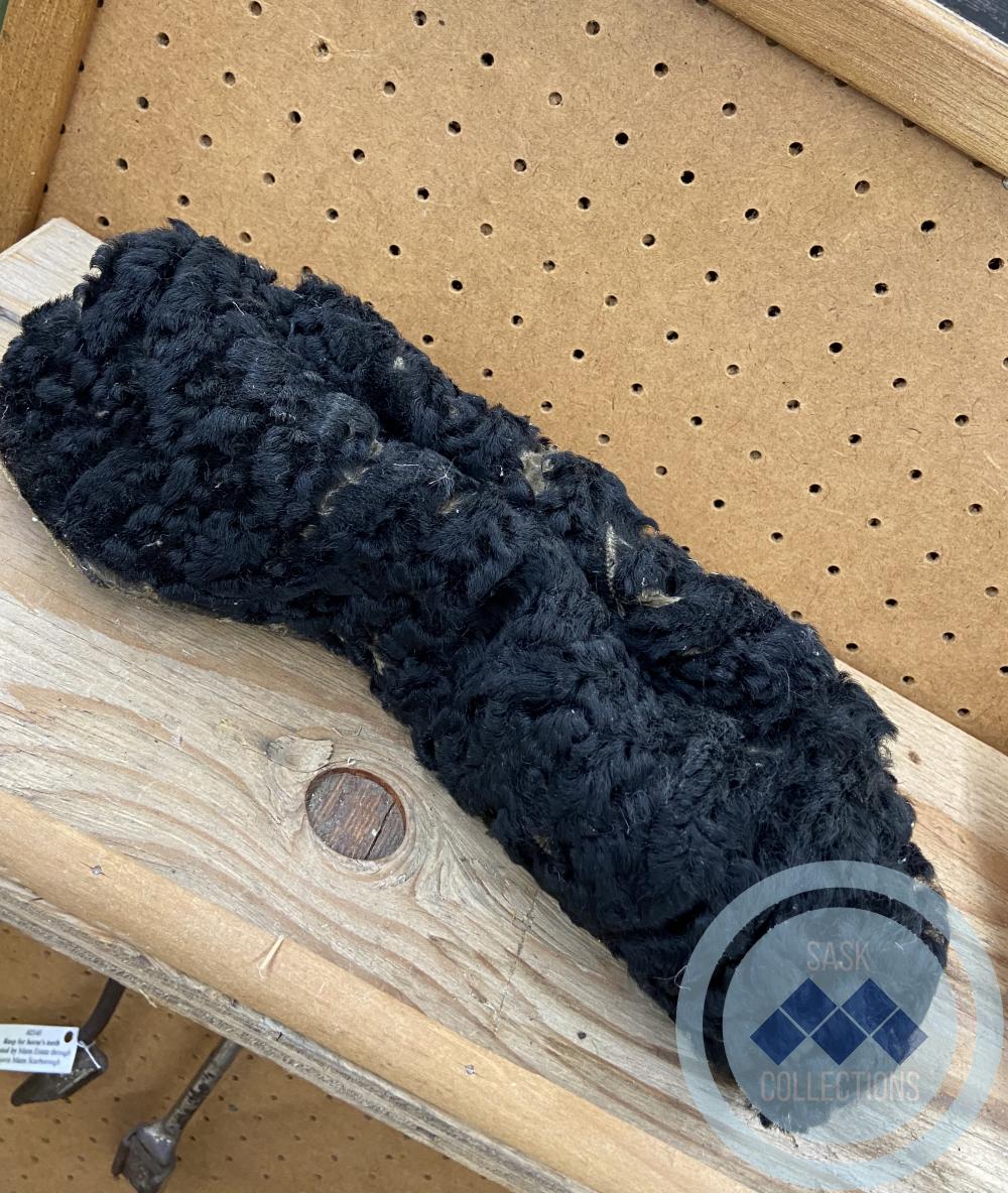 Black Fur Cap - Worn in the winter by Dr. Mann