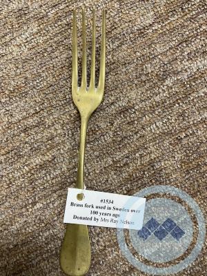 Brass fork used in Sweden over 100 years ago