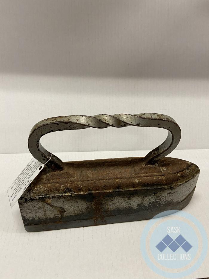 Iron. Used by Mary Nicol (Mrs. David Nicol). R. A. (Ainsley) can remember his mother ironing with this when he was a little boy. (1920s and 1930s)