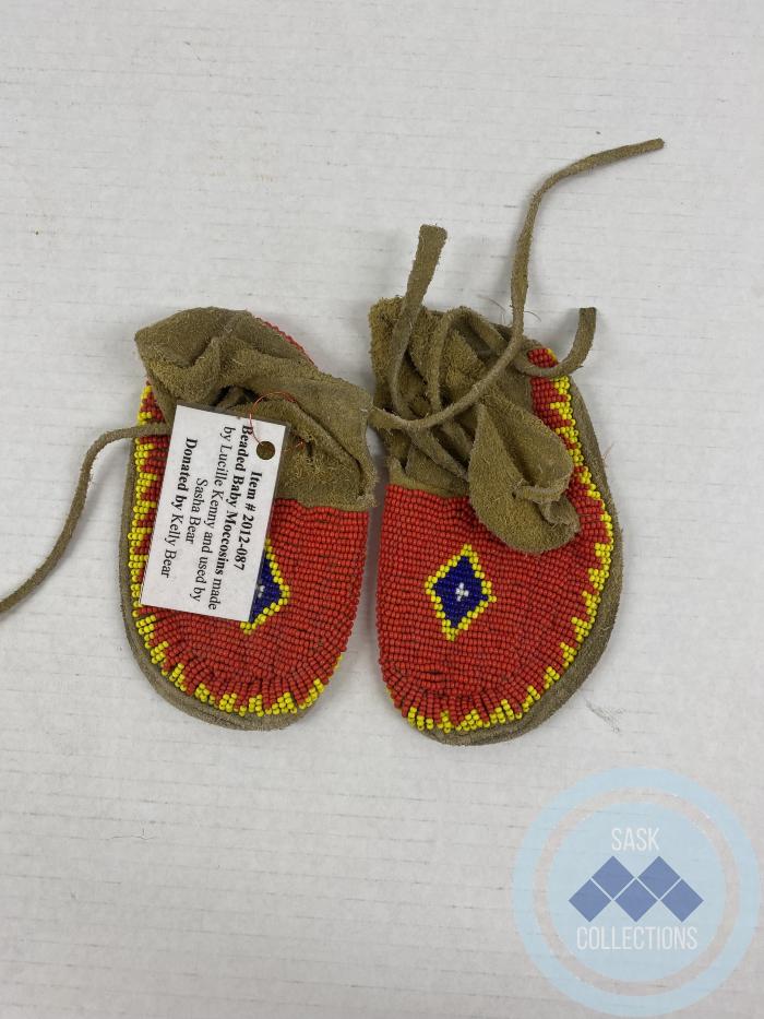 Beaded baby moccasins: <i>made by Lucille Kenny, used by Sasha Bear</i>
