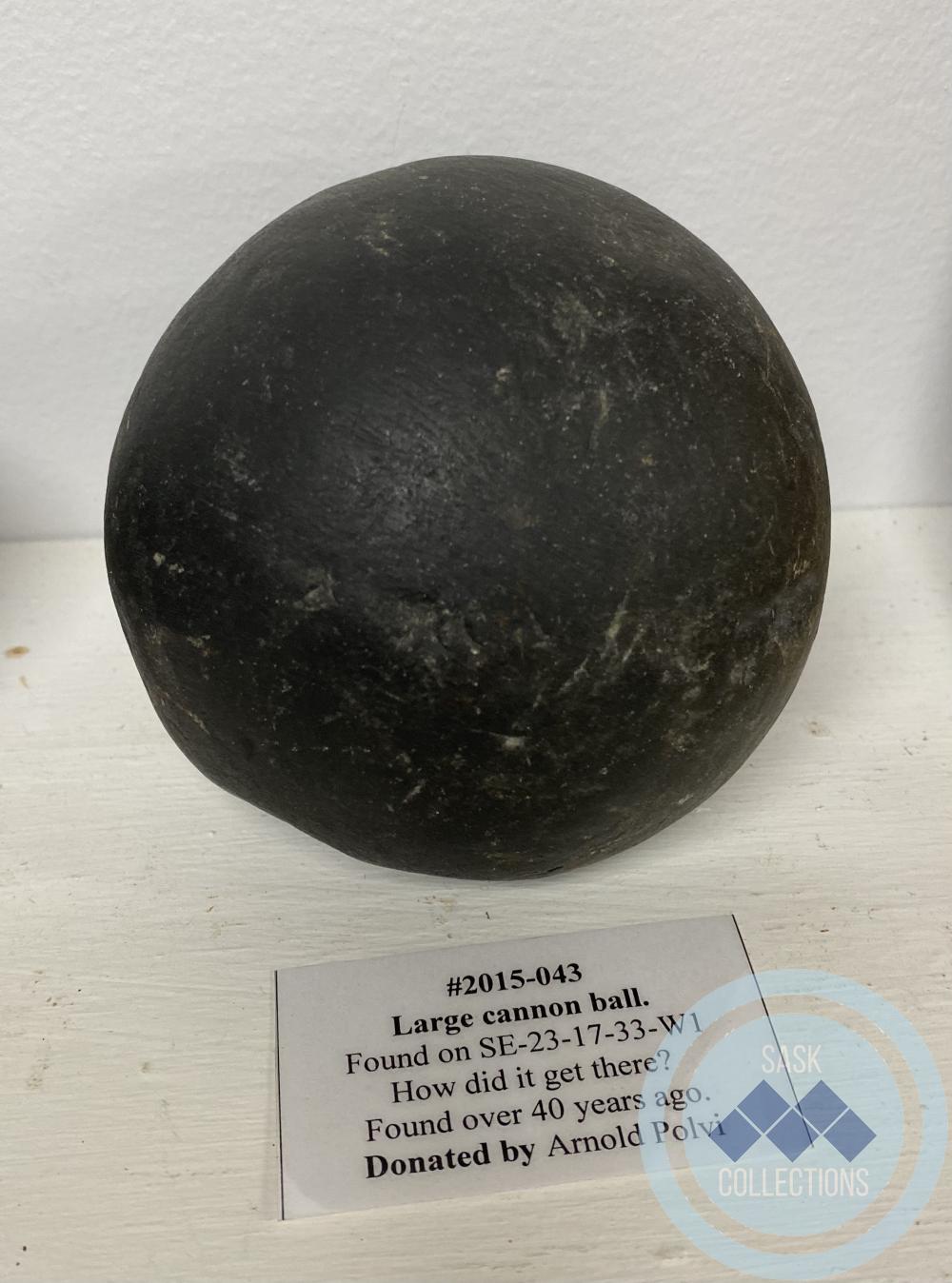 Large cannon ball. Found on SE-23-17-33-W1 How did it get there? Found over 40 years ago.