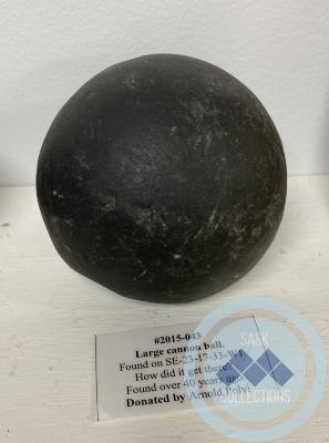 Large cannon ball. Found on SE-23-17-33-W1 How did it get there? Found over 40 years ago.