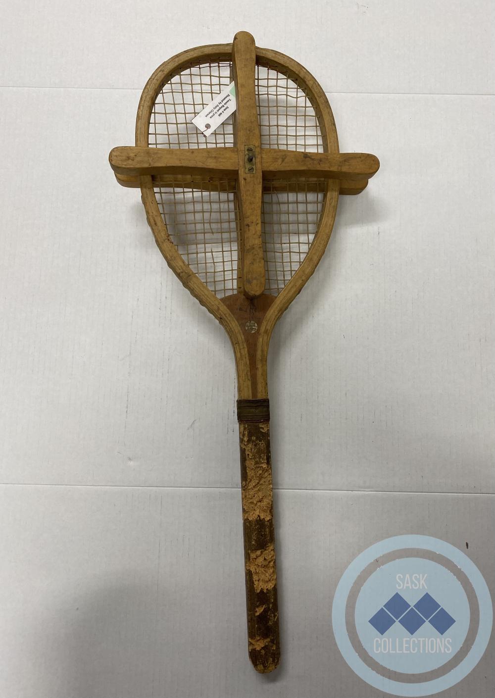 Tennis Raquet in press