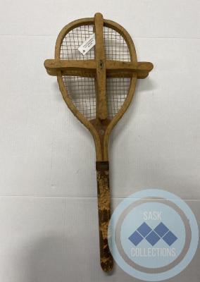 Tennis Raquet in press
