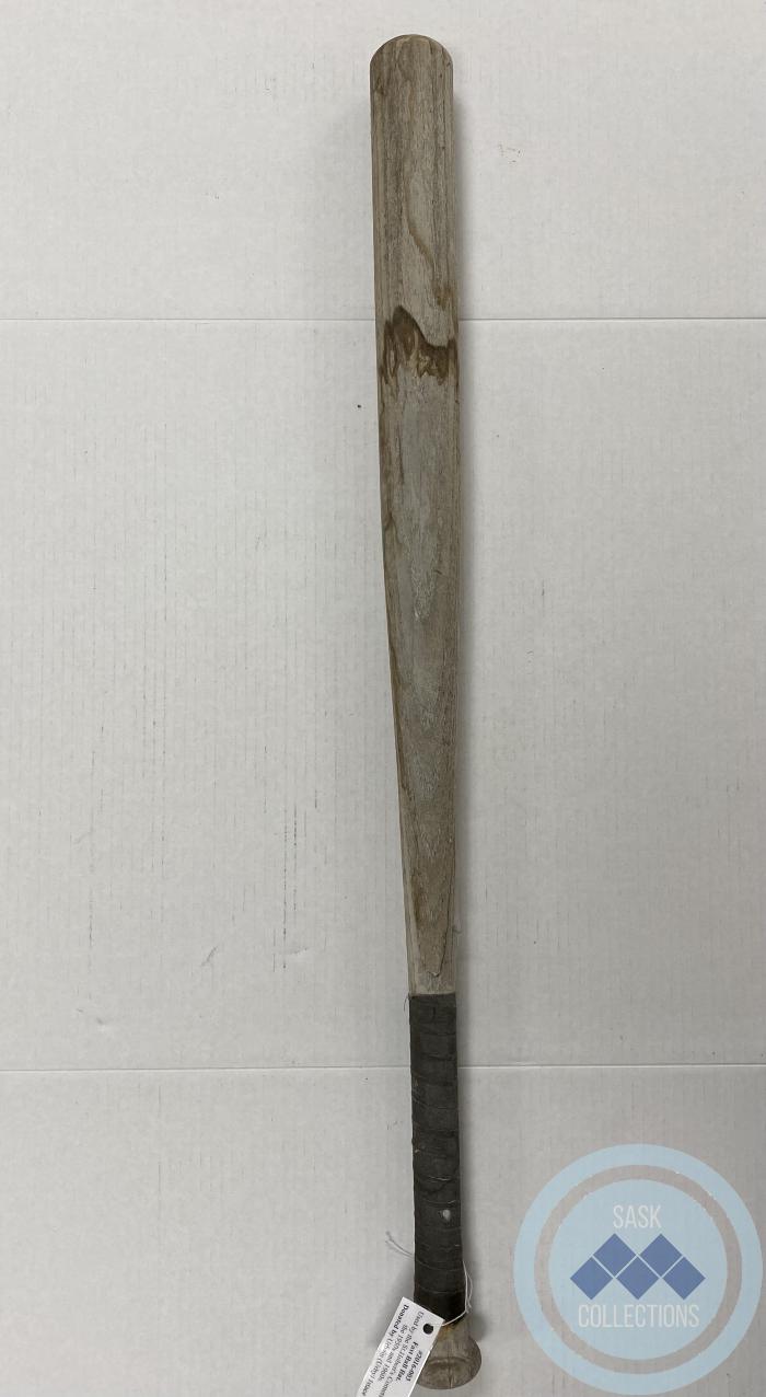 Fast ball bat. Used by the St. Hubert's Comets in the 1950s and 1960s.