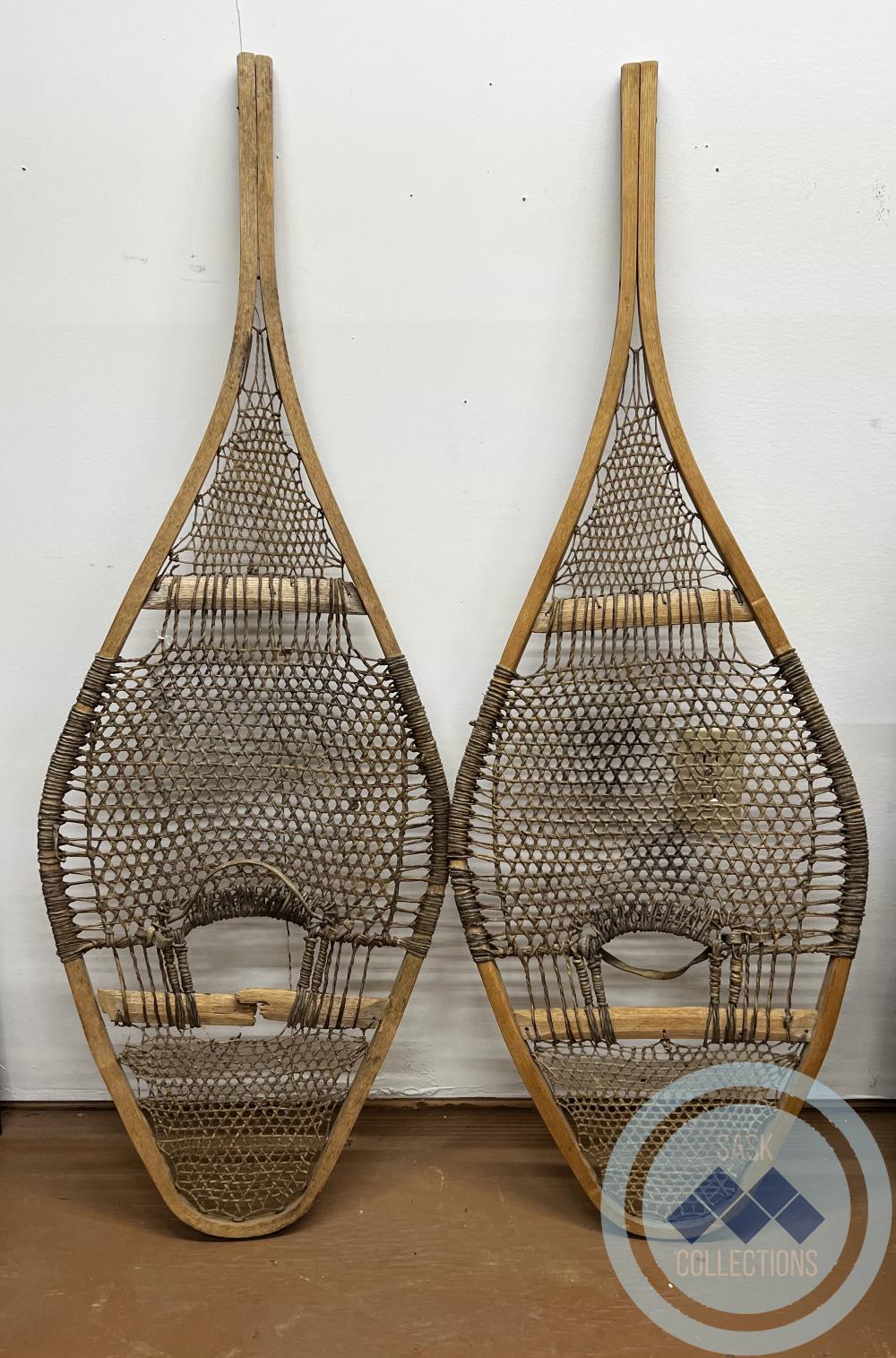 Pair of wooden snowshoes