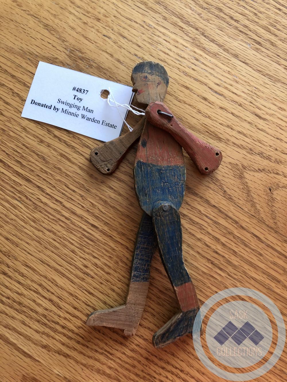Toy - swinging man