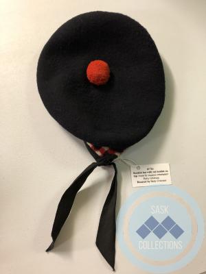 Scottish hat with red bobble on top - worn by musical entertainer Betty Grierson