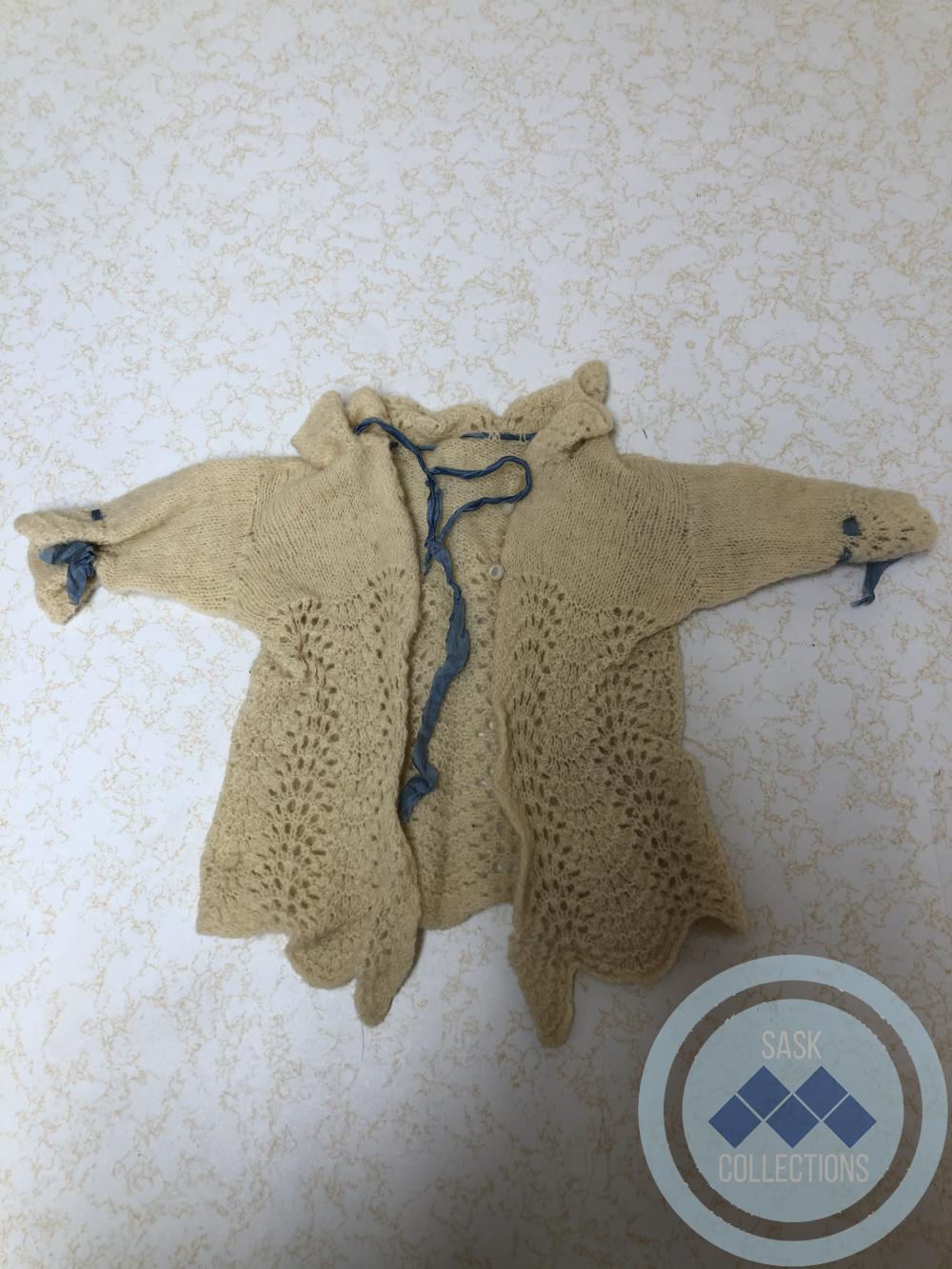Baby sweater - cream and blue ribbon