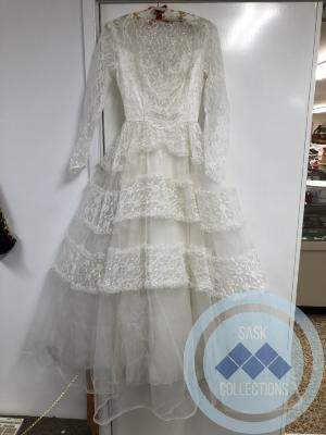 Lace Wedding Gown- was worn by Joan Johnson, who married Fred Harrison in Sept. 1958 (parents of Joan were Charlie and Winnifred Johnson). 
