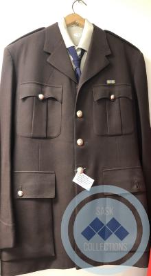 RCMP Brown Service Jacket, beige shirt, navy tie and brown pants (winter)